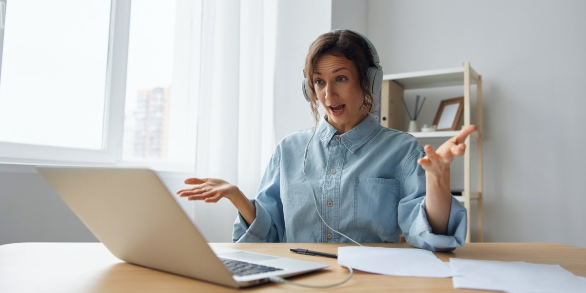 PC software failure. Angry businesswoman lost all important documents due laptop breakdown working