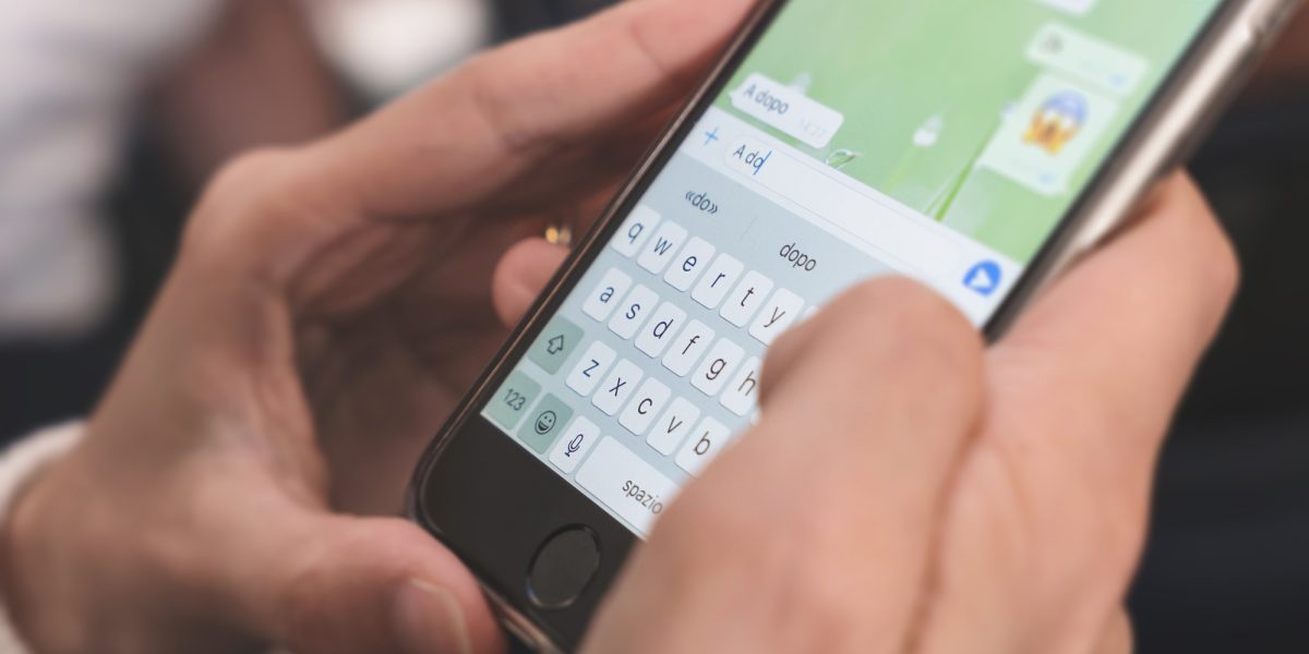 Woman hands using smartphone